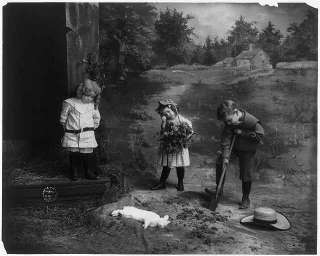 children burying dead rabbit,by Fitz W. Guerin  
