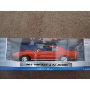  1969 Pontiac GTO Judge Orange 1:18 Scale: Toys & Games