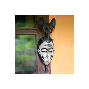    NOVICA Ivoirian wood mask, Brave and Strong