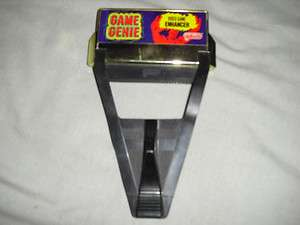 nintendo game genie with code book  