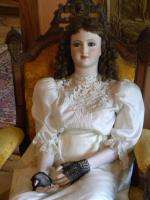 LIFE SIZE PORCELAIN DOLL 4 10 TALL  