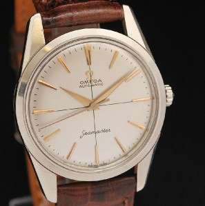   sweep second hand. Outer minute track. Signed Omega, Automatic