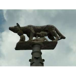  The Statue of the She Wolf Atop a Post Outside the Duomo 