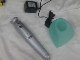   Pro Styler for parts open unit with charger, defective REVO  