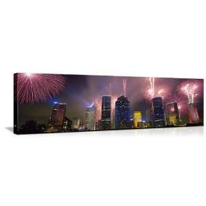  Fireworks over buildings in a city, Houston, Texas, USA 
