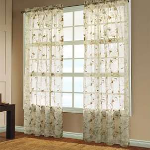 Sheer curtains in front of a large window