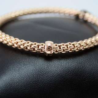 gold with brown diamonds and pink sapphires 18ct rose gold flex it 