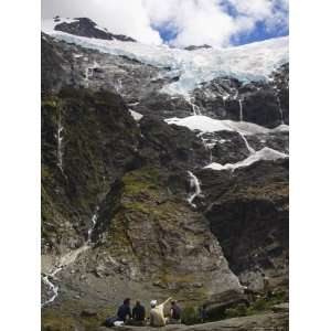  Hikers Watch Water Cascading off Rob Roy Glacier in Mount 