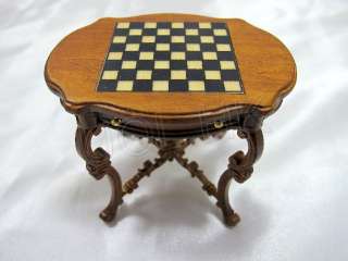 Drawer can open, that checker board made by wood inlay into the table.